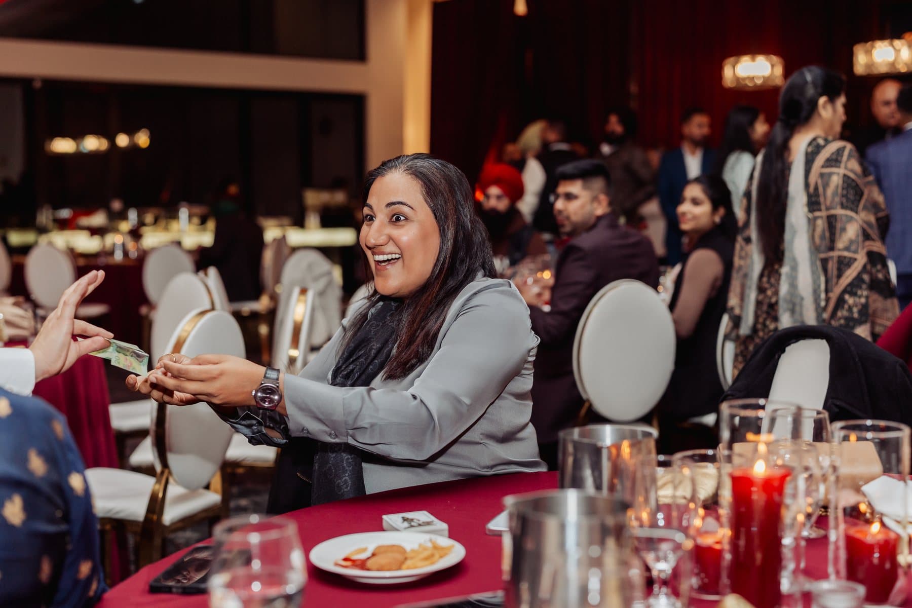 John Ha Magic event reaction photo from the Best Magic Pictures gallery: ktl holidayparty michellediamond 505