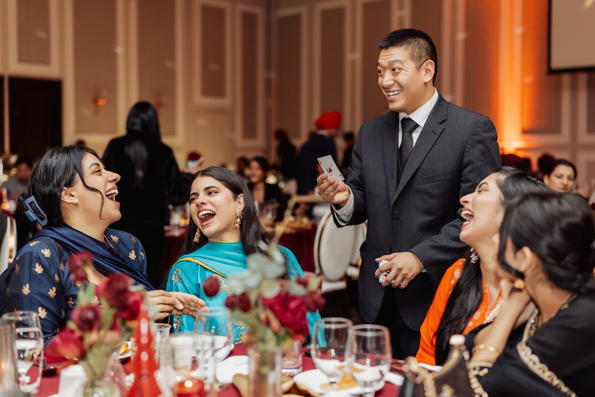 Event guests reacting to close-up magic